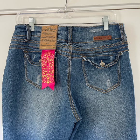 Y2K Blue distressed boot cut jeans with a medium wash and mid rise - Picture 7 of 7